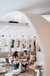 Couple dining in modern restaurant with bright interior and arched ceilings