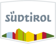 Logo Südtirol mit bunten Bergformen