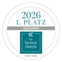 Circular award badge: 1st place Newcomer 2026, CC Die besten Hotels Südtirol