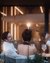 Couple enjoying wine and live music in a cozy setting